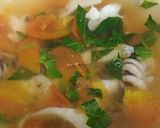 Hình bước làm 3 của món Canh cà chua nấu mực