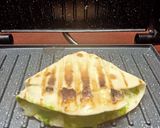 A picture of step 10 of Tandoori paneer tikka grilled tortilla wrap.