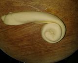 A picture of step 7 of Chapati (Soft, layered) served with coconut beans.