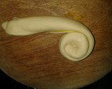 A picture of step 7 of Chapati (Soft, layered) served with coconut beans.