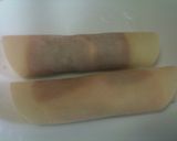A picture of step 4 of Basil Pork Rolled in Gyoza Skins.