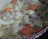 A picture of step 11 of Easy Rich Cream Stew in a Le Creuset Pot.