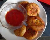 A picture of step 6 of Veg pinwheel tikki roll.