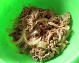 A picture of step 7 of Marinated Beef and Onions.