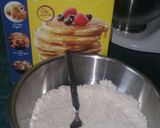 A picture of step 2 of Baked Bisquick Crunchy Drumsticks.