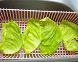 A picture of step 2 of Rolled Cabbage with Fried Tofu and Wiener Sausages.