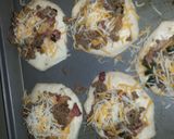 A picture of step 7 of Cheesy beef bacon explosion.