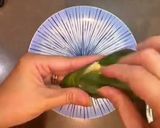 A picture of step 4 of Chicken wrapped in fragrant pandanus leaves. (Pandan Chicken).