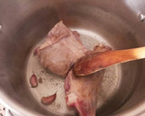 Foto del paso 6 de la receta: Codillo de paletilla de cordero, en salsa de ajos, perejil y mostaza