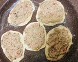 A picture of step 4 of Sfiha with Tomato and Tahini.