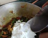 A picture of step 13 of Dahi wali bhindi.