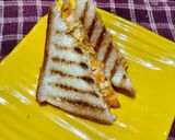 A picture of step 6 of Easy peasy cheesy sandwich.