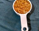 A picture of step 1 of Brown Rice and Jaggery Payesh.