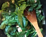 A picture of step 7 of Miso roasted squash with ginger garlic tofu and greens - vegan.