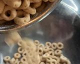 A picture of step 3 of Gluten-Free Peanut Butter Cereal Bars (with Cheerios).
