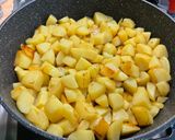 Une image de l'étape 6 de Pommes de terre sautées aux oignons nouveaux.