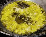 A picture of step 3 of Soya granules with potato and fresh green peas.