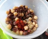A picture of step 11 of Pita Bread Chick Pea Kidney bean filling with Tzatziki sauce.