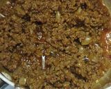 A picture of step 1 of Rice and meat.