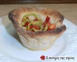 A picture of step 17 of Bouyiourdi in a dough bowl alla Conna.