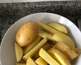 Foto del paso 1 de la receta: Patatas al horno tipo gajo