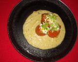 A picture of step 11 of Stuffed tomato with white gravy.