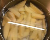 A picture of step 2 of Peri Peri Fries -spicy & crispy.