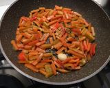 A picture of step 2 of Fregola Sarda with Clams, Bell Pepper, and Roasted Datterini Tomatoes.