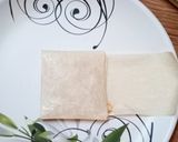 A picture of step 4 of Makhni chicken parcel.
