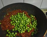 A picture of step 10 of Aloo Matar Curry.