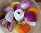 A picture of step 1 of Veg turmeric pulao.
