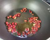 A picture of step 2 of Poha with Potatoes Peas and Pomegranate.