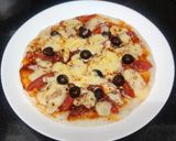 A picture of step 6 of Italian pizza.