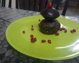 A picture of step 10 of Chocolate Disc on chocolate cup cake.