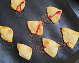 A picture of step 14 of Strawberry Stuffed Baked Samosa with Chocolate Ganache.