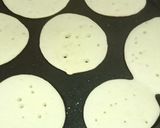 A picture of step 2 of Nolen Gurer Chitai Dudh Pithe.