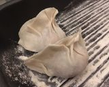 A picture of step 5 of Homemade pork and cabbage dumpling 🥟.