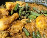 A picture of step 7 of Bhindi chicken.
