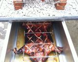 A picture of step 24 of Roast whole Pig.