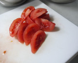 A picture of step 3 of Marinated Tomato and Cucumber.