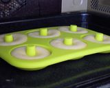 A picture of step 6 of Use Up Egg Whites! Baked White Doughnuts!.