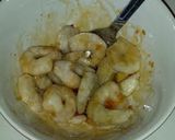 A picture of step 1 of Wok-fried prawns with broccoli and bok choy.