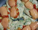 A picture of step 3 of Cheesy Spicy Chicken with stuffing.