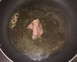 A picture of step 2 of Couscous jollof.