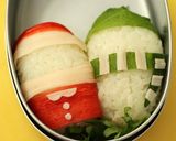 A picture of step 2 of Cylinder Shaped Onigiri Rice Balls: Santa Christmas Bento.