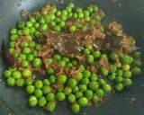 A picture of step 10 of Baby Potato Curry with Green Peas.