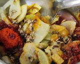 A picture of step 4 of Khatta Meetha Amla Pickle.