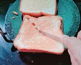 A picture of step 3 of Cheese,potatoes,onion toast sandwich 🍞 with Haldi wala milk.