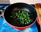 A picture of step 2 of Bhindi Shorshe/Sarson.