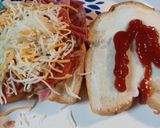 A picture of step 2 of Leftover Pizza Topping Sandwich.
